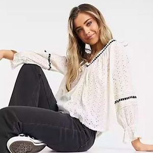 Elegant White Blouse with Black Accents